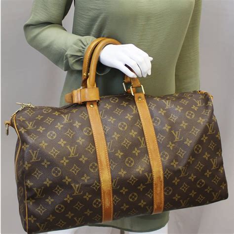 gold louis vuitton duffle bag|louis vuitton duffle bag monogram.